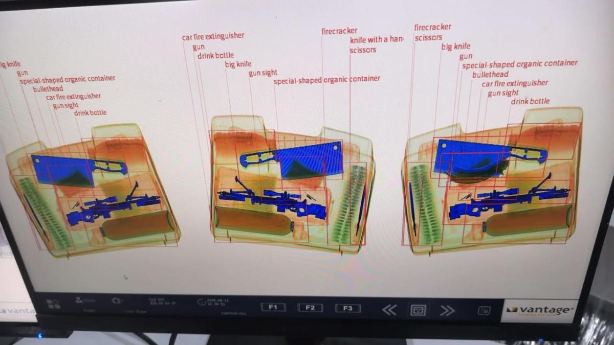Vantage X-ray monitor demo footage labelling a handgun, knife, scissors and firecracker